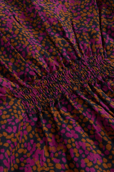 Close up of ruched detail on cord organic cotton tunic