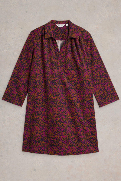 Cord organic cotton tunic with pink and orange print, laid flat on a neutral background