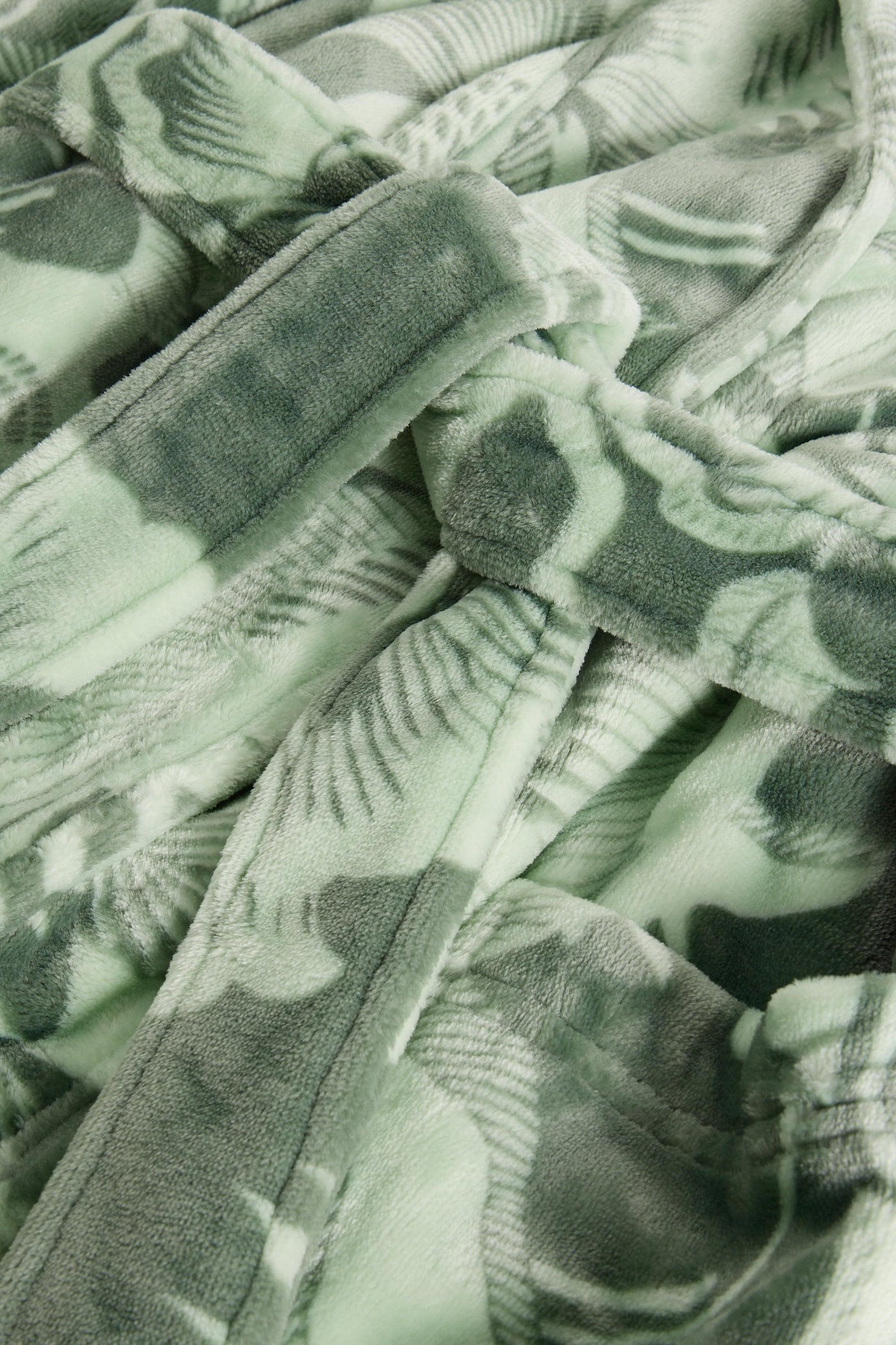 Close-up of a green camouflage-patterned fabric