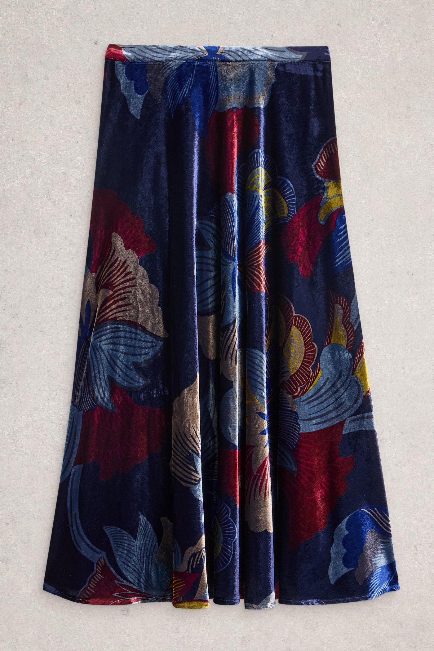 Colorful floral-patterned fabric on a light gray background