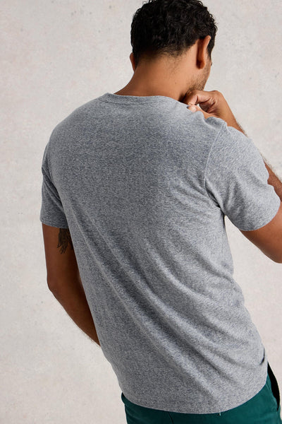 Back view of man wearing organic cotton grey t-shirt