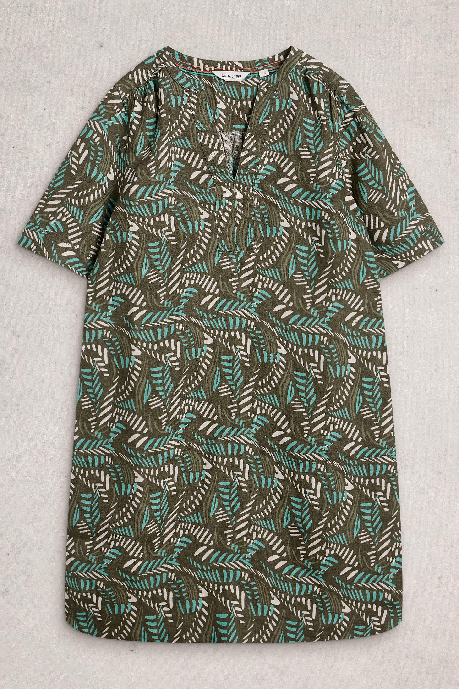 Patterned linen dress on a light gray background