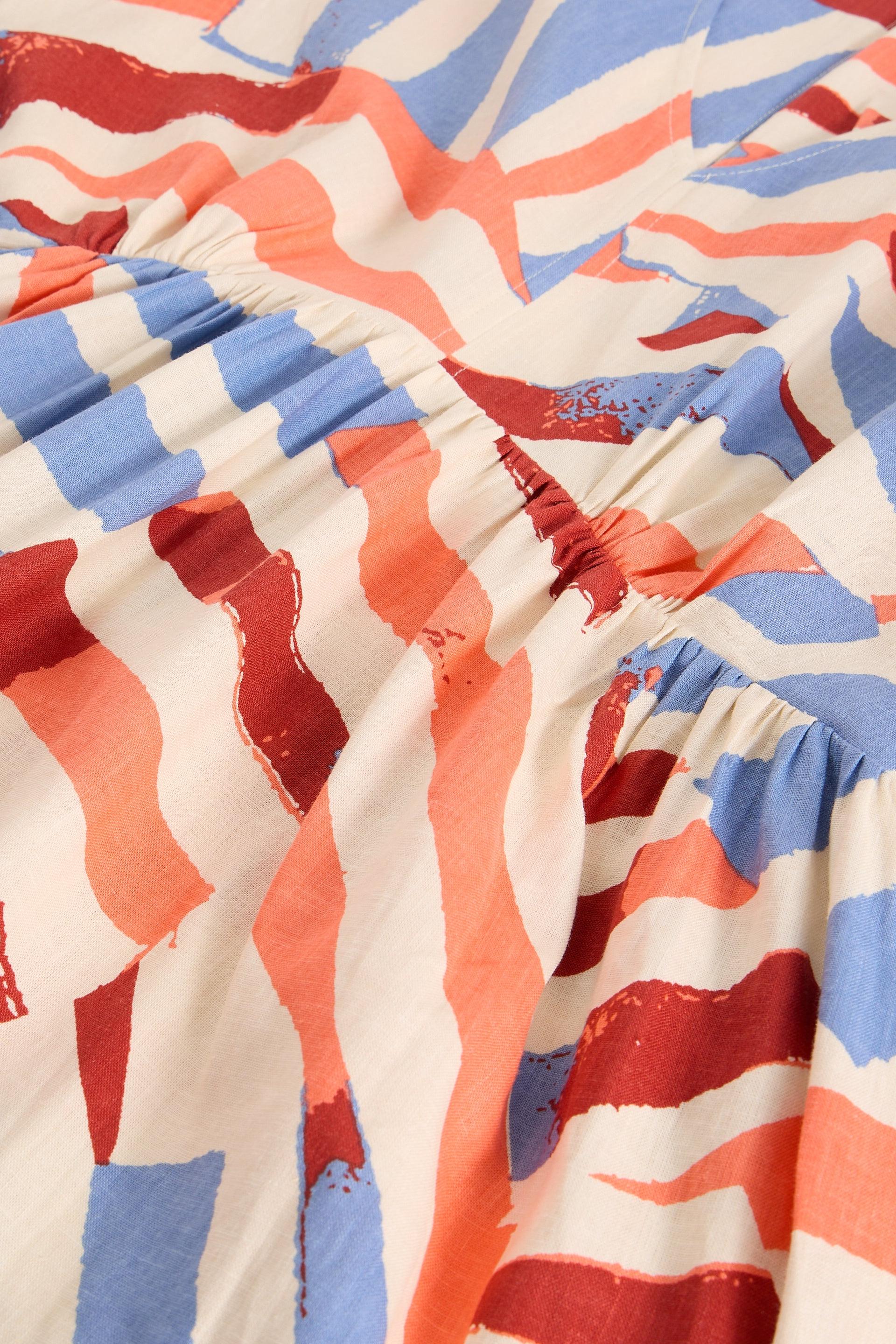 Close-up of linen fabric with red, blue, and white pattern