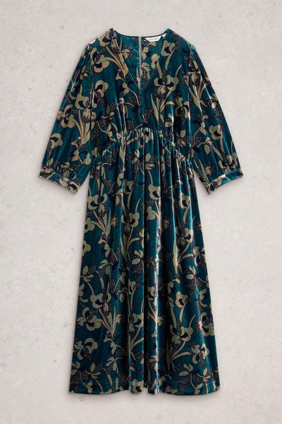 Long-sleeve velvet dress with floral pattern on a light gray background