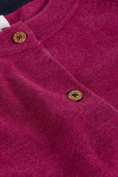 Close up of buttons on organic cotton plum cardigan