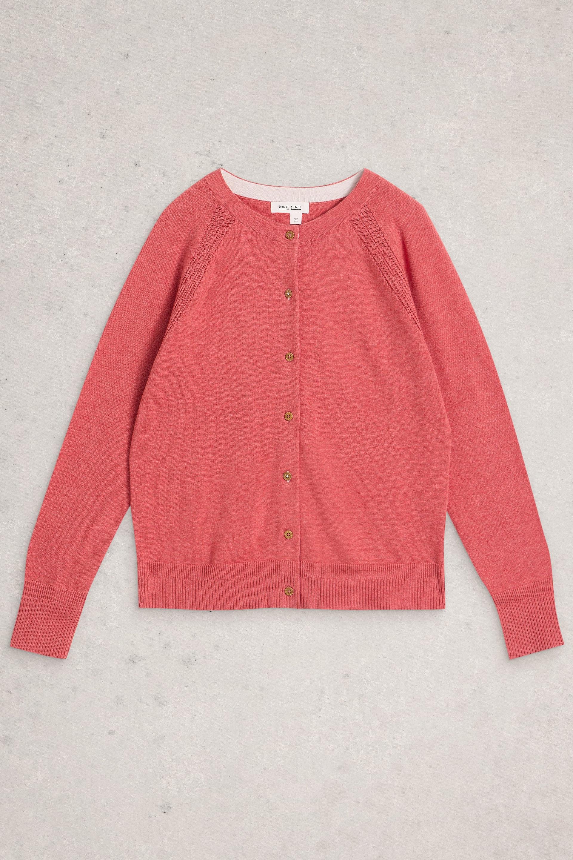 Pink organic cotton cardigan on a light gray background