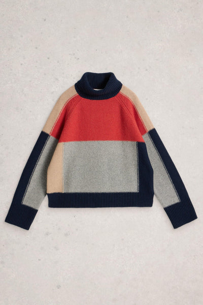 Coluor-blocked organic cotton sweater with red, beige, gray, and navy sleeves on a light gray background