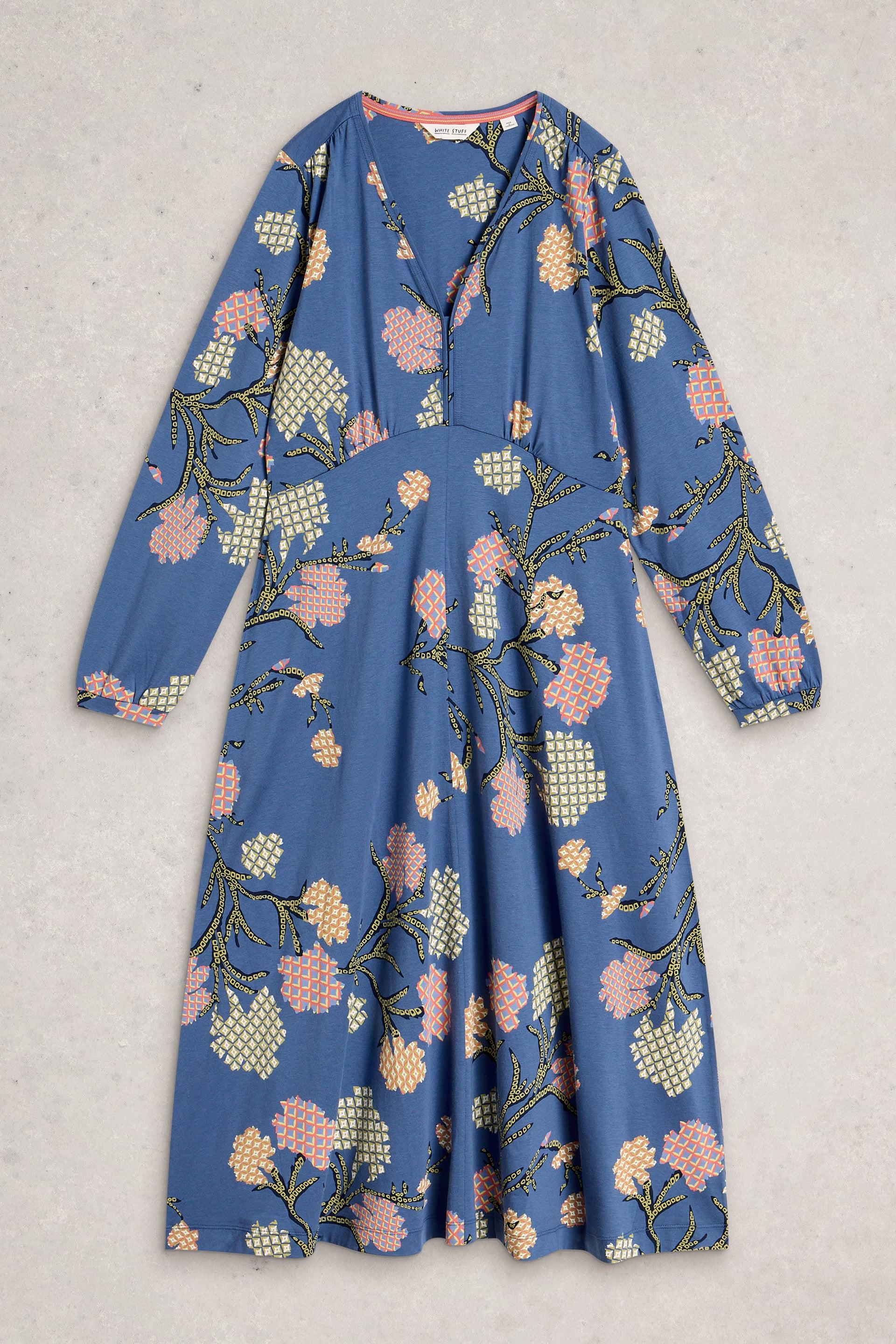 Blue floral organic cotton dress on a light gray background