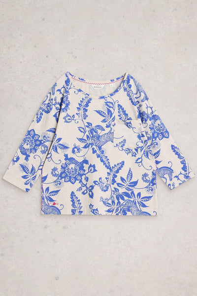 Blue floral patterned shirt on a gray background