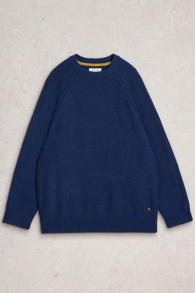 Blue wool sweater on a light gray background