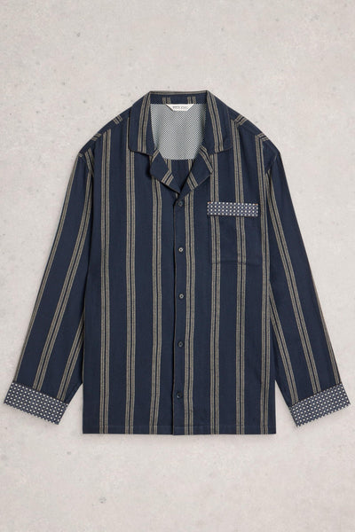 Navy striped organic cotton shirt with white buttons on a light gray background