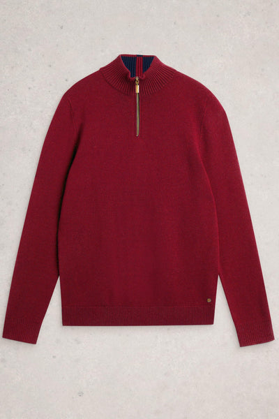 Flat lay of red merino wool knit with quarter-zip neck