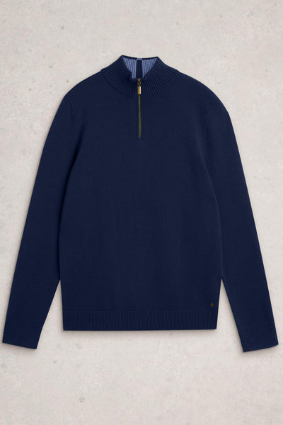 Flat lay of navy merino wool long sleeve knit