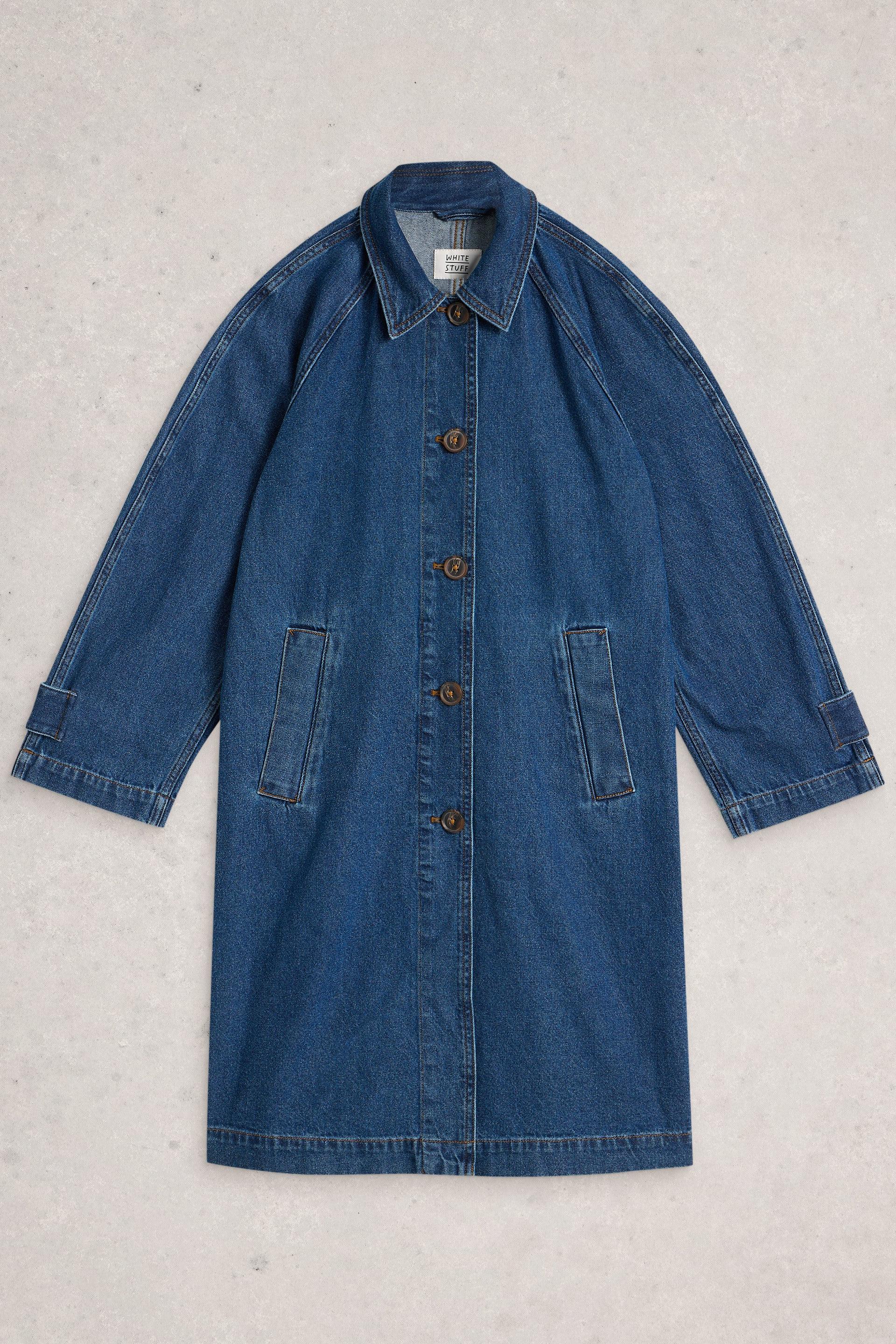 Blue denim coat on a light gray background