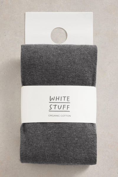Pack of gray tights with 'White Stuff' label on a beige background