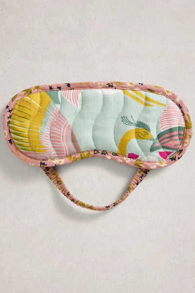 Colourful organic cotton eye mask with a pattern on a light gray background