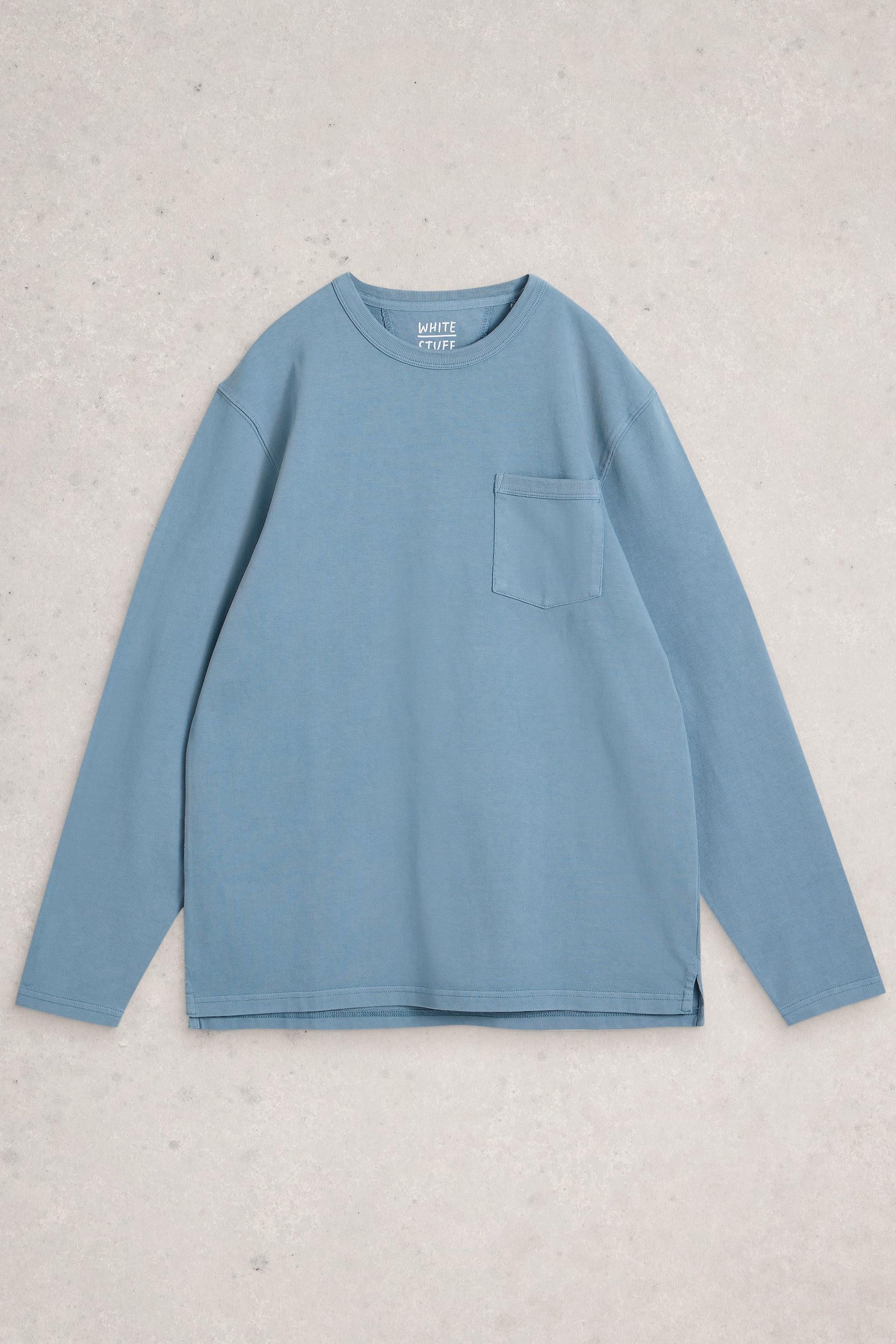 Blue long-sleeve shirt with a pocket on a light gray background