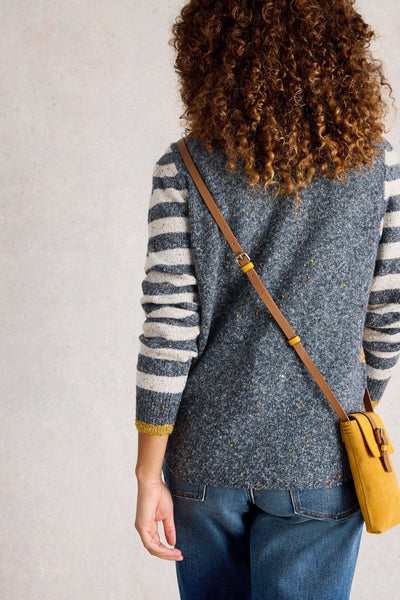 Back view of organic cotton knit jumper showing a blue back and white and blue striped sleeves