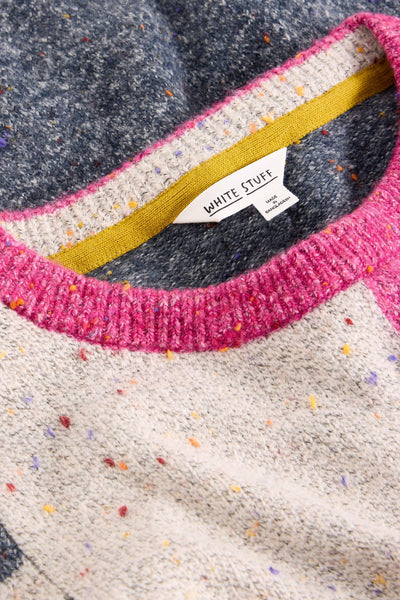 Close up of pink crew neck collar on organic cotton knit jumper