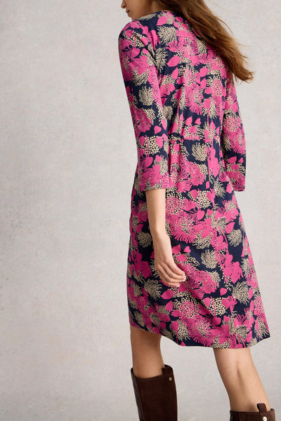 Back view of organic cotton pink floral dress with knee length and 3/4 sleeves