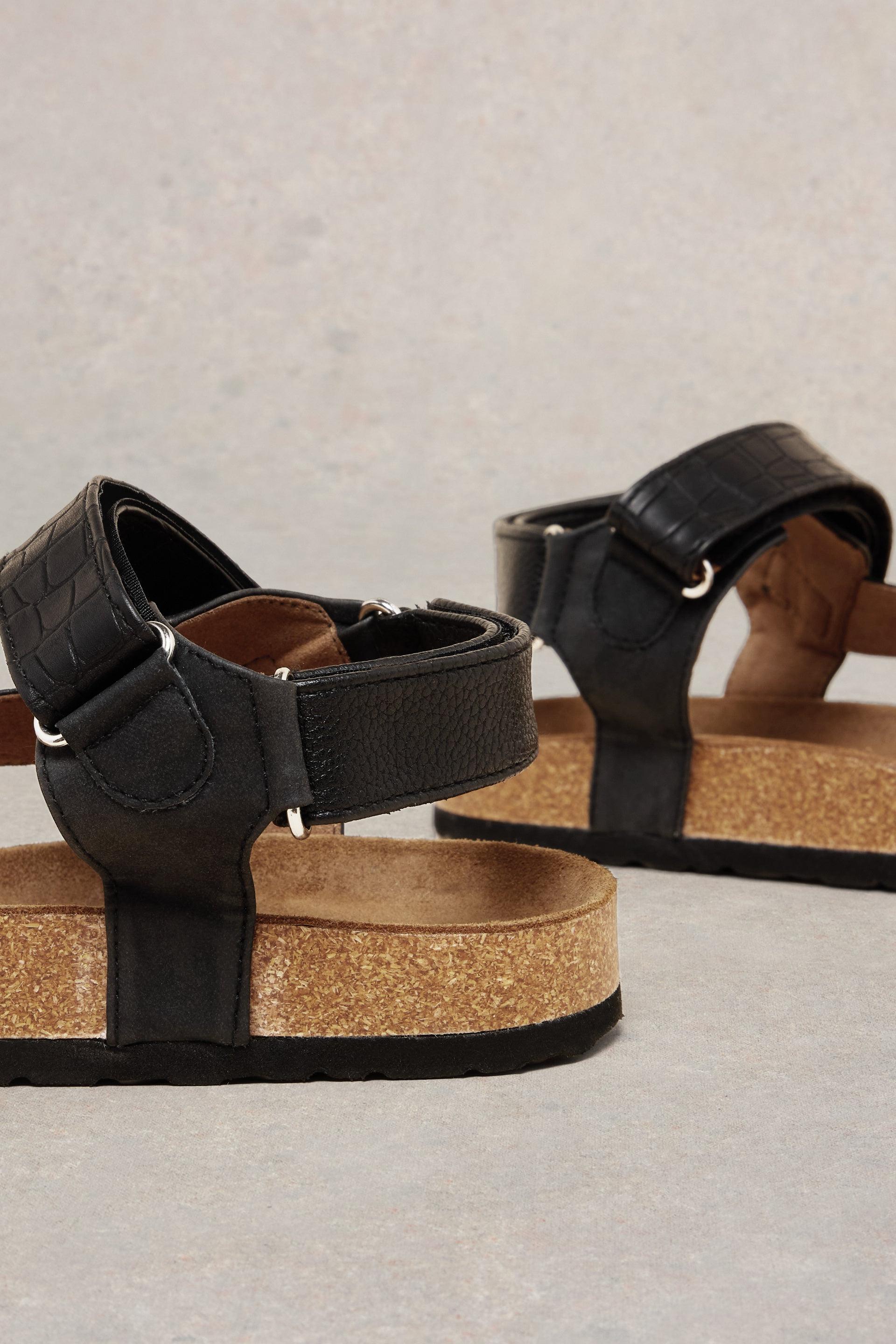 Close up of velcro strap on heel.