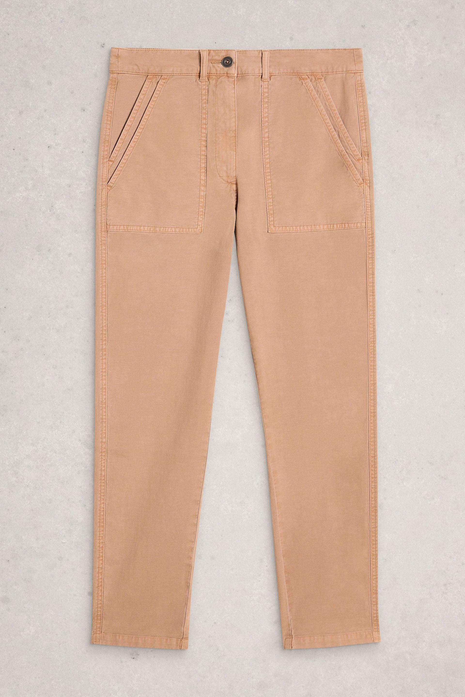 Beige pants on a light gray background