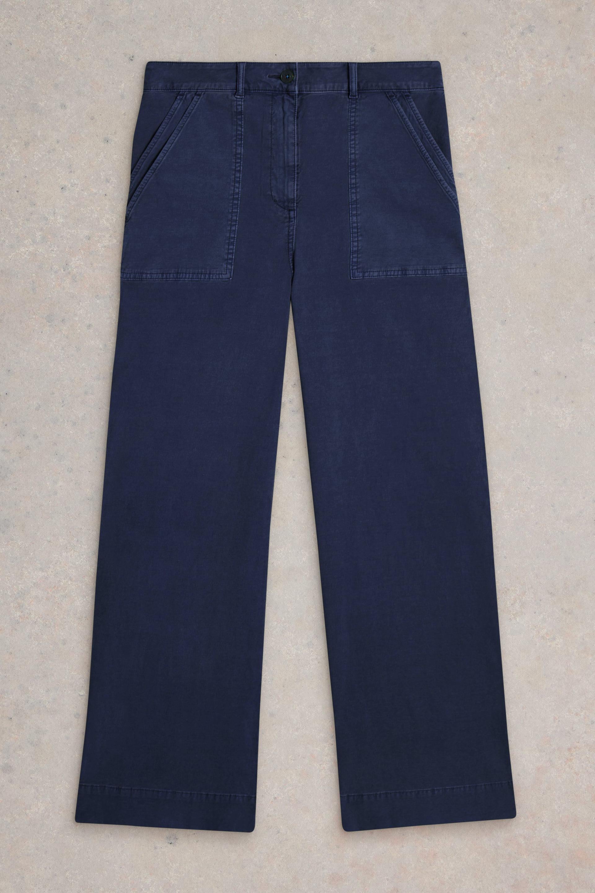 White Stuff Twister Chino Wide Leg Dark Navy Trousers on grey background.