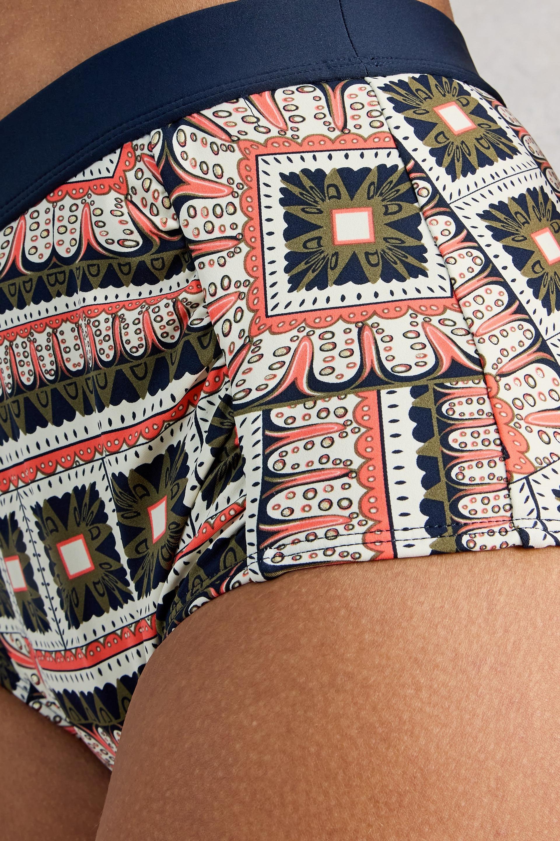 Patterned bikini with a geometric design on a plain background