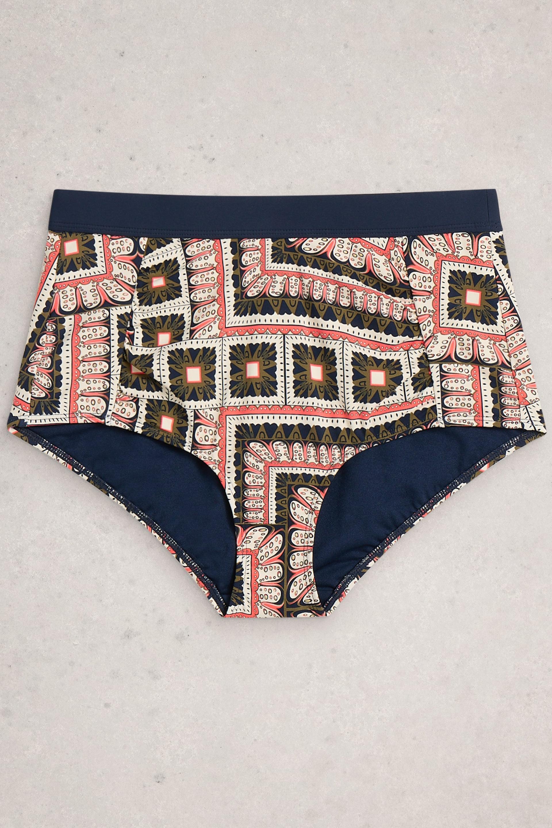 Patterned high waist bikini bottoms with a geometric design on a light gray background
