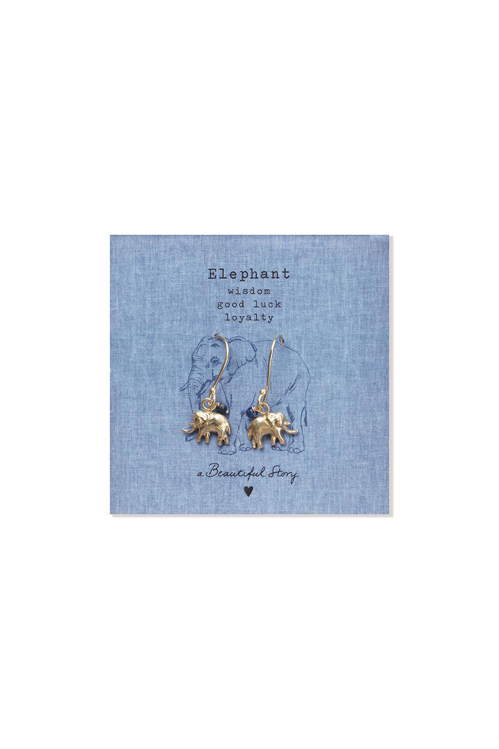 Gold elephant earrings on a blue card with text and an elephant illustration, brand 'a Beautiful Story' visible.