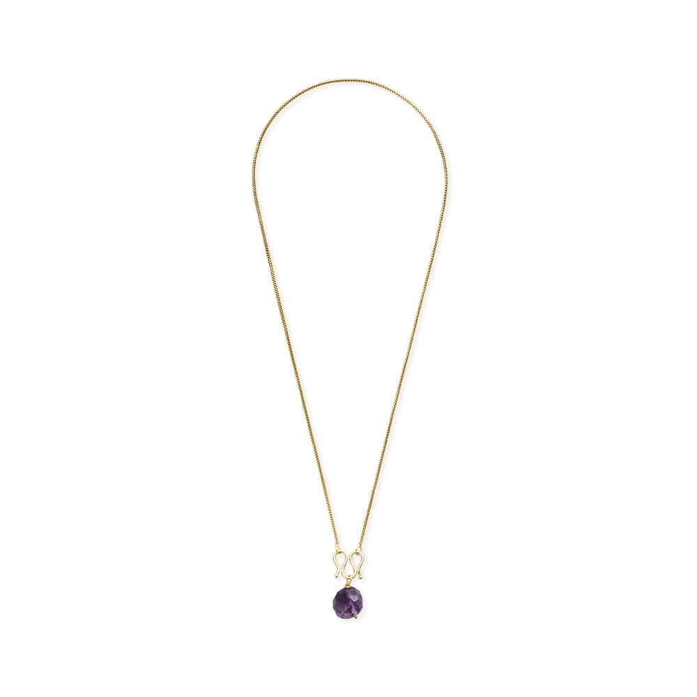 A delicate gold necklace featuring a single faceted purple amethyst gemstone pendant.