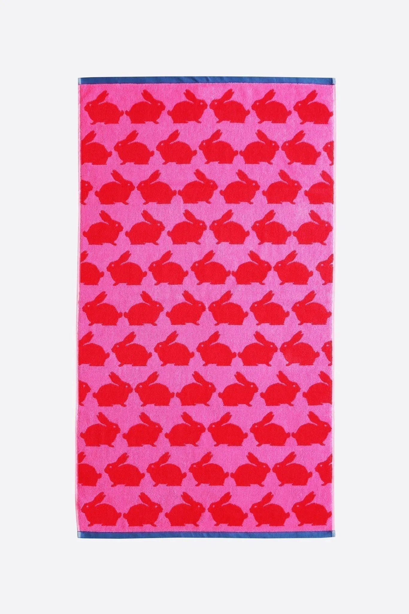 Organic cotton towel with red bunny pattern on pink background
