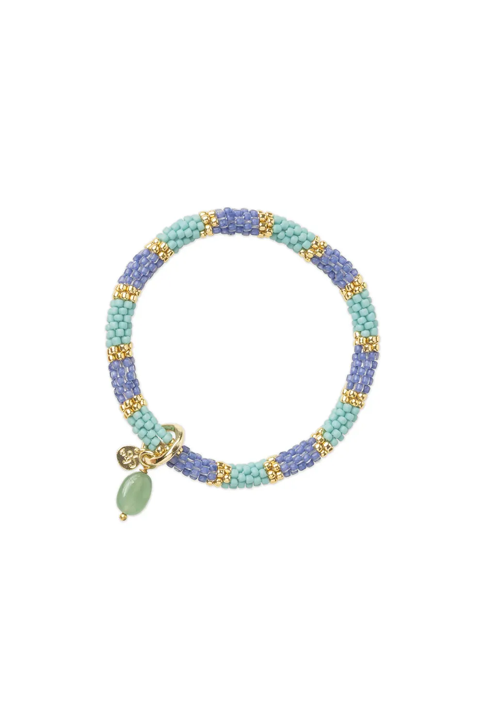 Multicolored beaded bracelet with a green charm on a white background