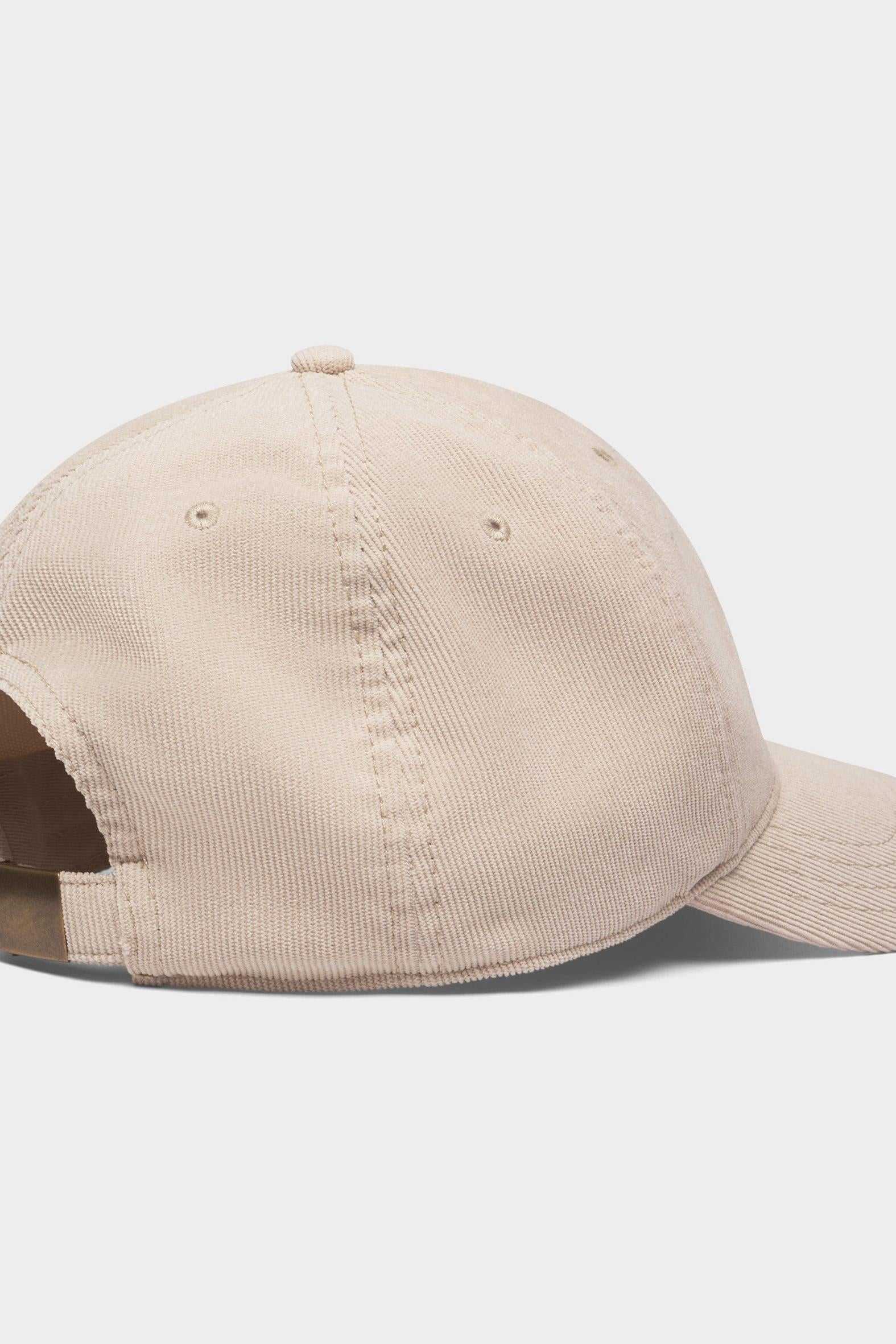 A light beige cotton twill baseball cap shown from a rear three-quarter angle on a light gray background.