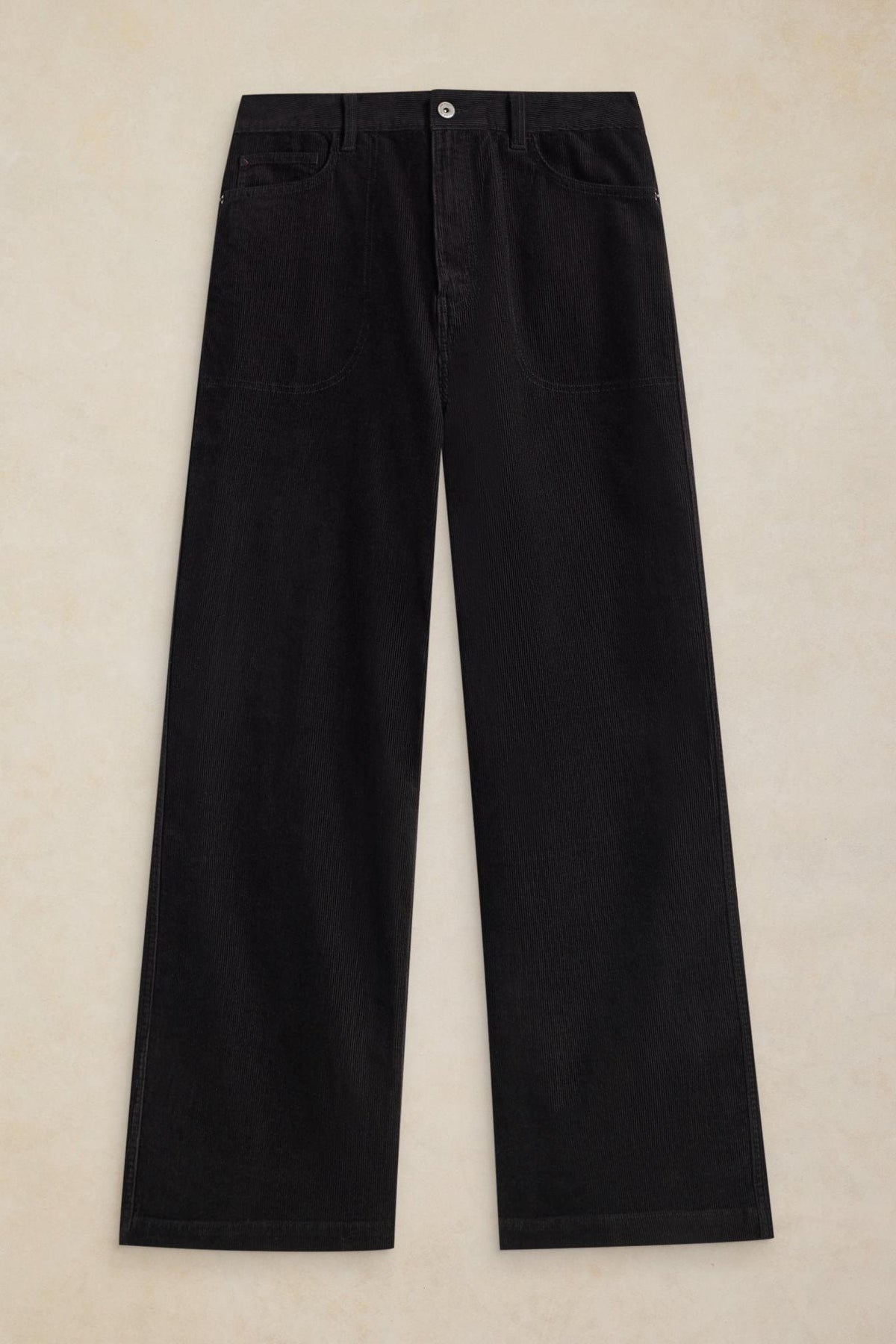 Wide leg black corduroy trousers made from organic cotton, displayed flat against a neutral background.