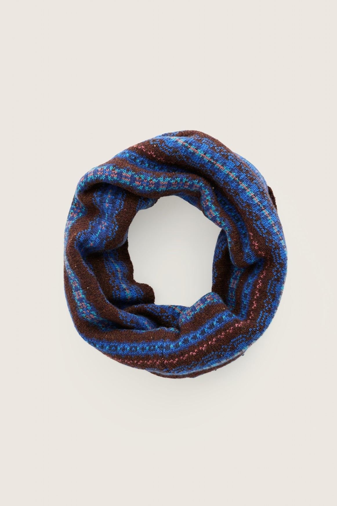 A cozy blue and brown patterned Merino wool knit snood for women against a light background.