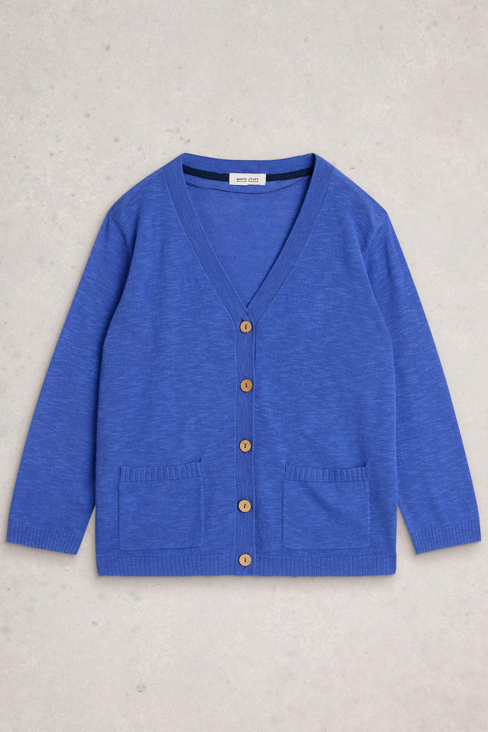 A blue White Stuff organic cotton cardigan with wooden buttons and two front pockets laid flat.