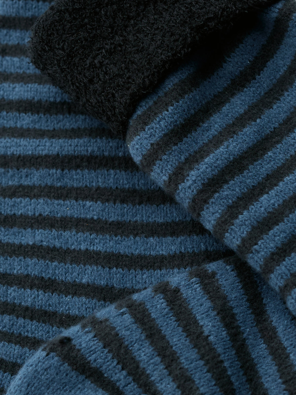 Close-up of soft blue stripe fluffy men's socks by Seasalt Cornwall