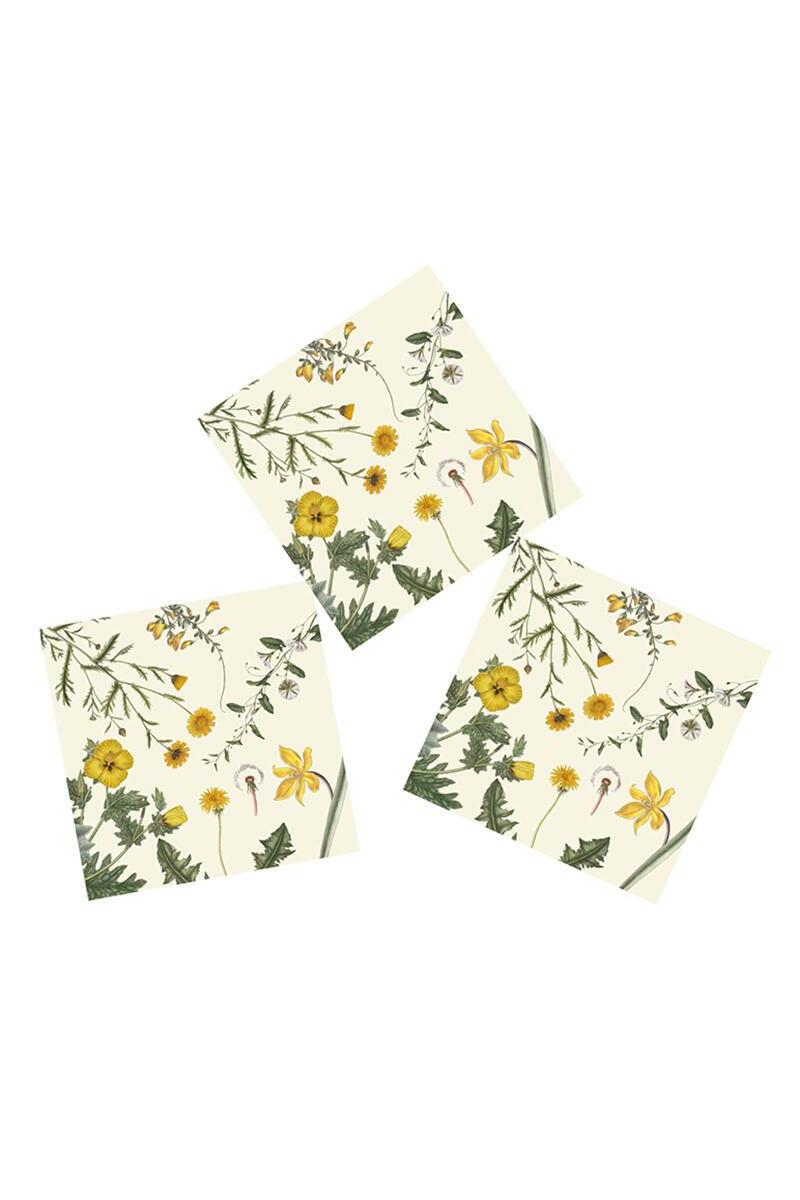 Three floral-patterned napkins on a white background