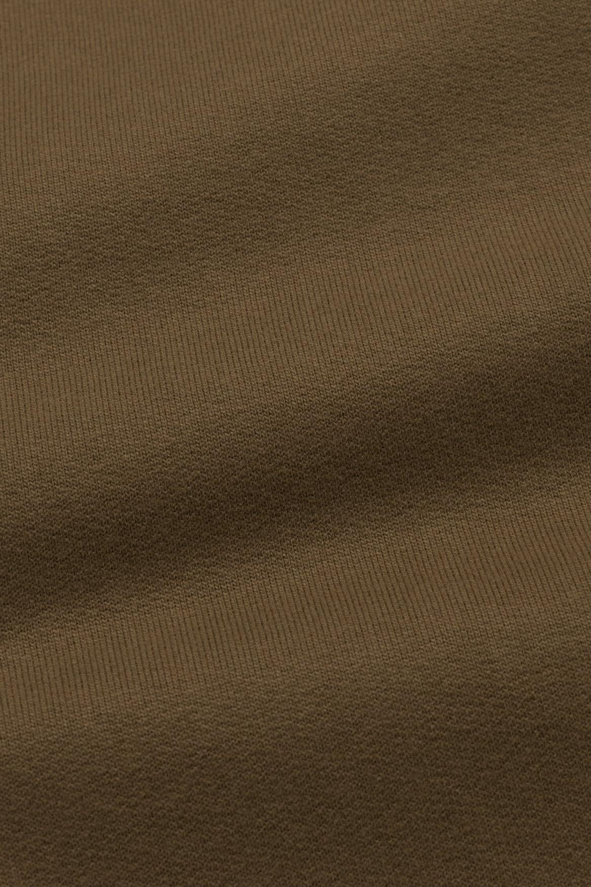 Close-up of brown fabric texture
