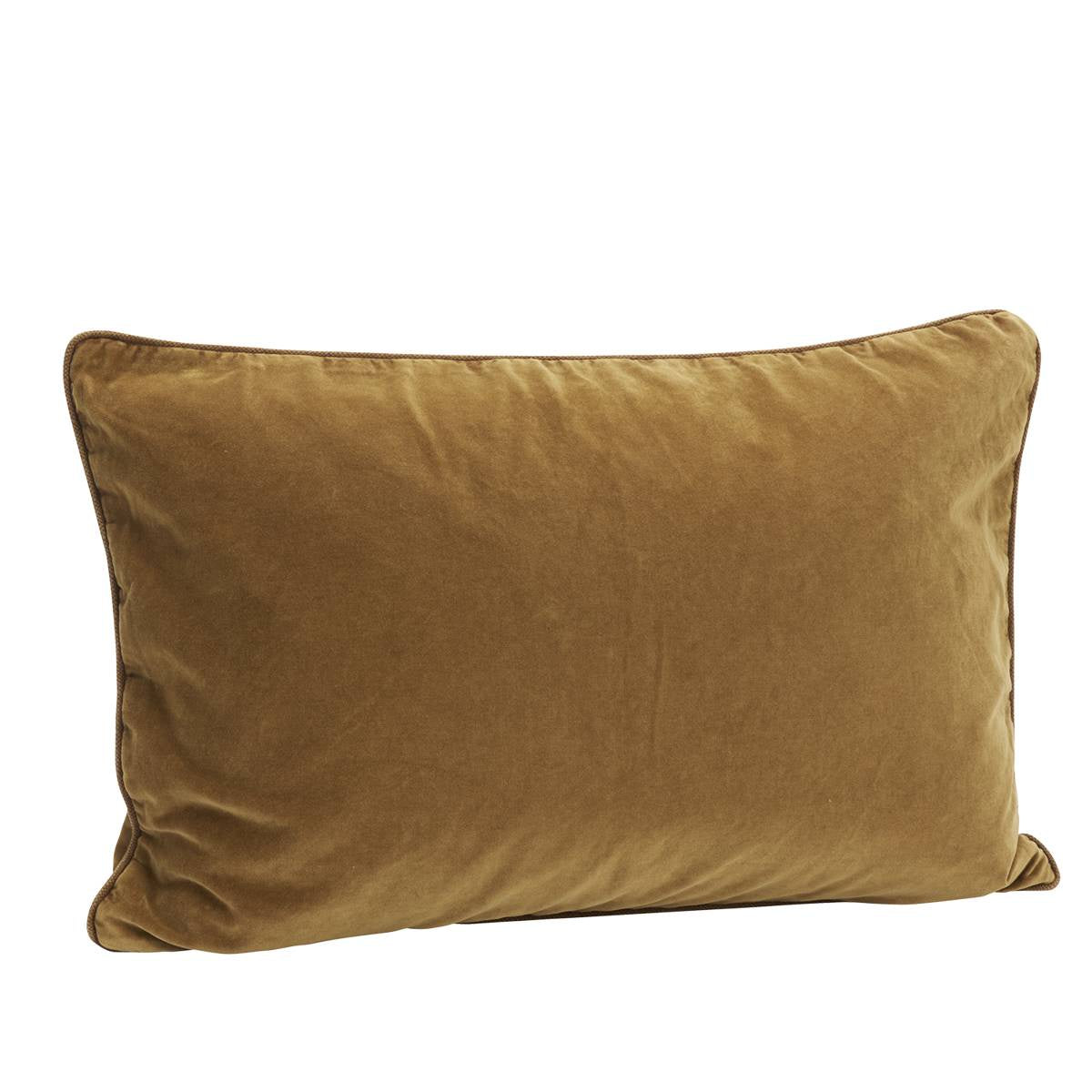 A rectangular velvet throw pillow in a warm camel brown color, shown against a plain white background.
