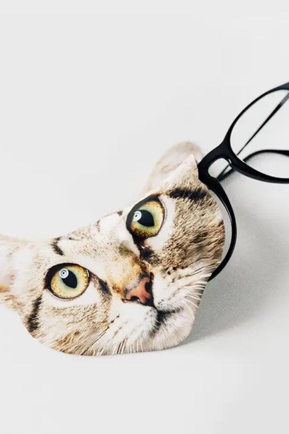 A feline-themed eyeglass cloth shaped like a tabby cat face.