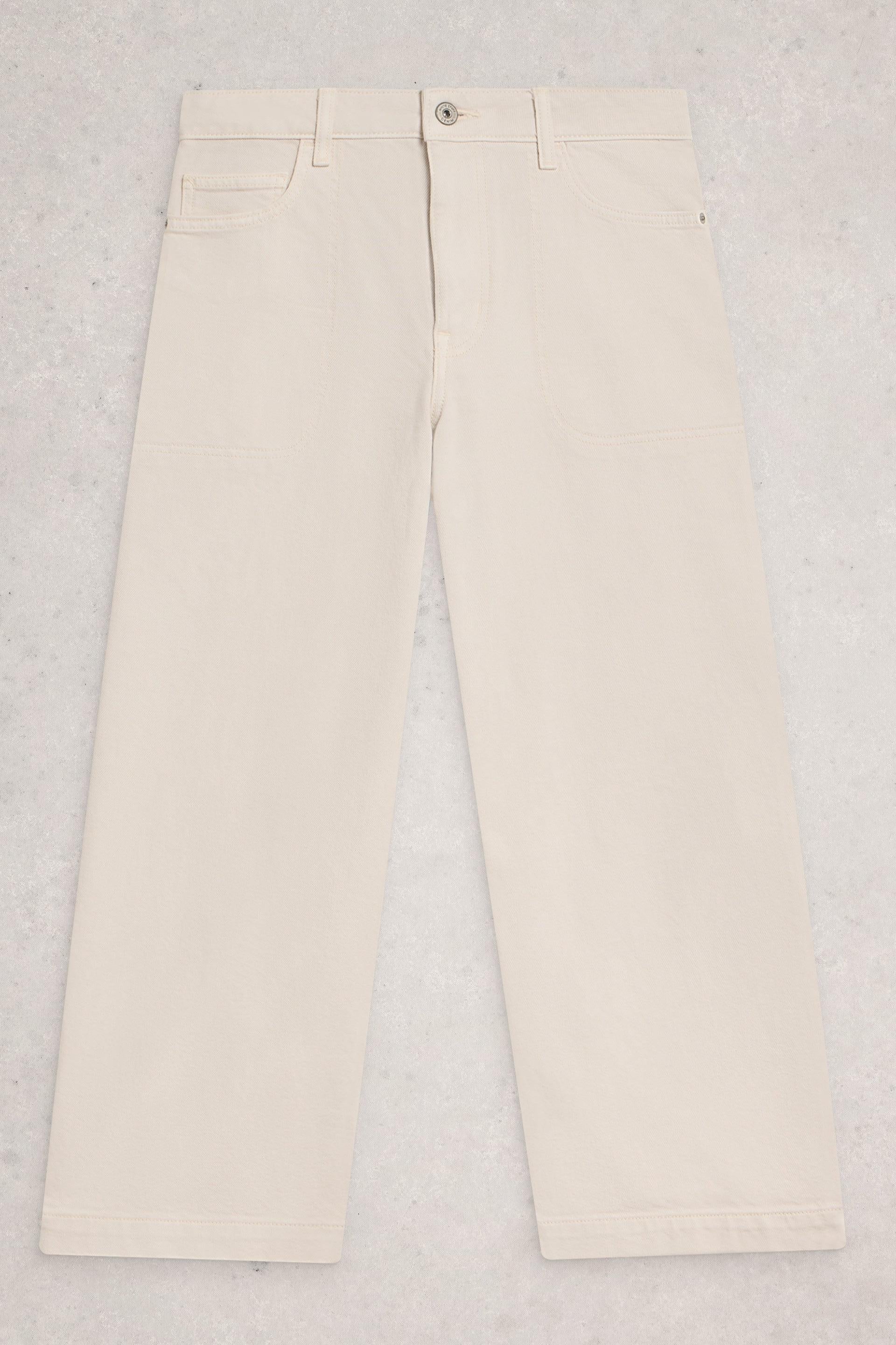 Beige organic cotton jeans on a light gray background