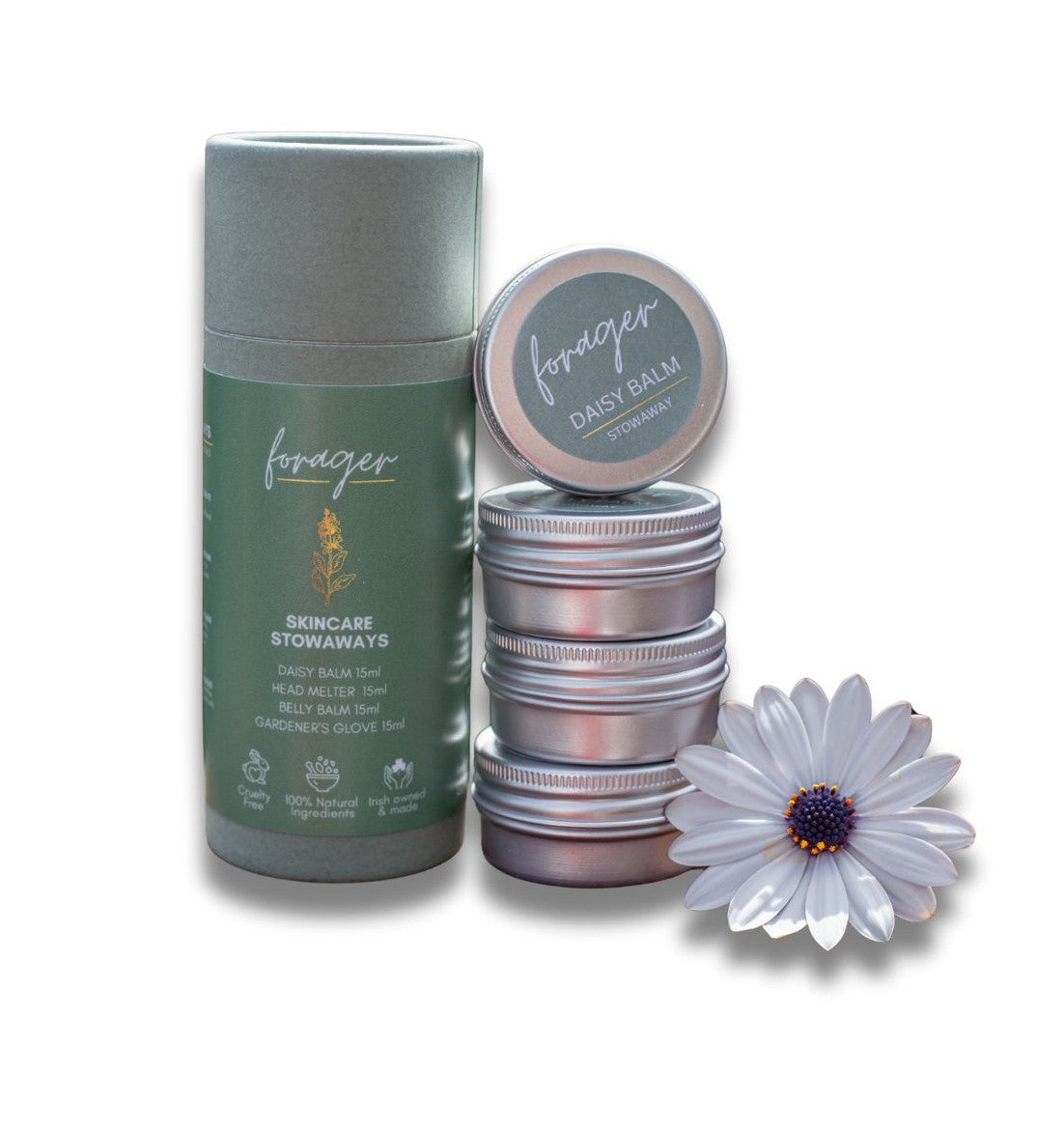 Forager Skincare Daisy Balm stowaway set with metal tins and a single white daisy flower against a white background.