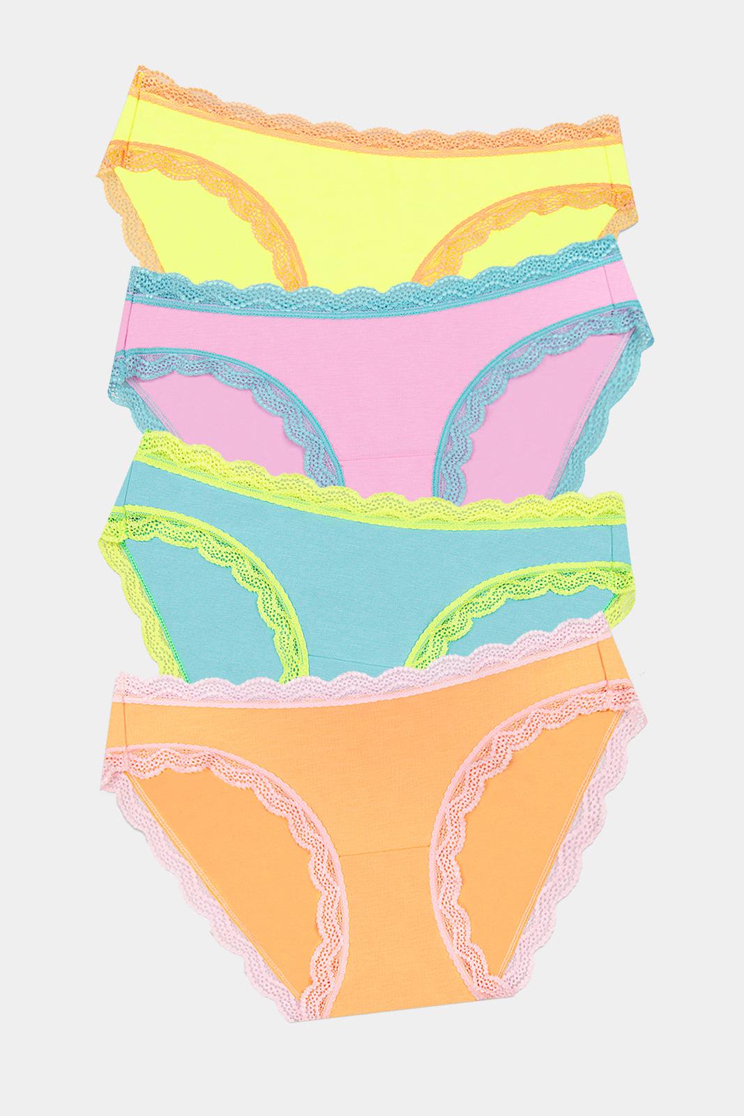 Set of four colorful underwear pieces on a light gray background