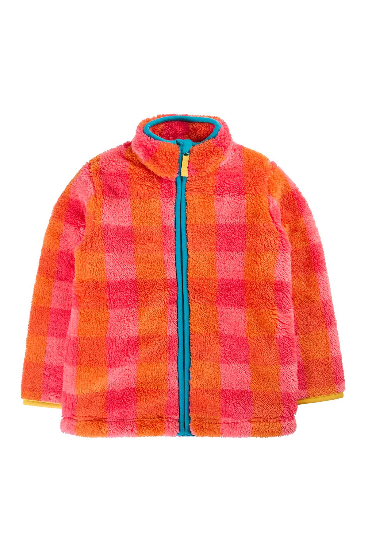 A colourful Frugi girls fleece jacket with an orange and pink checkered pattern and a blue zipper.