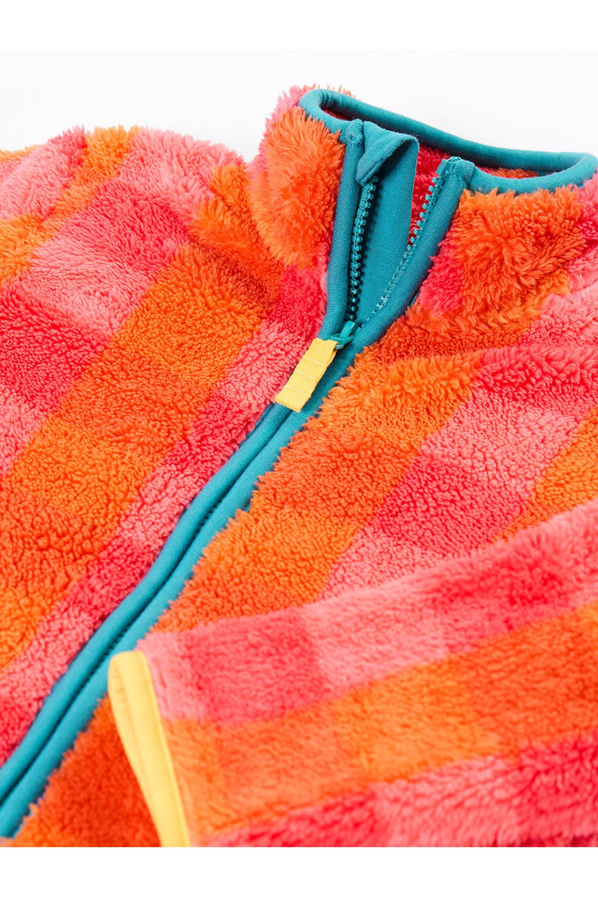 Close up of a colourful Frugi girls fleece jacket made from recycled polyester with teal zipper details.