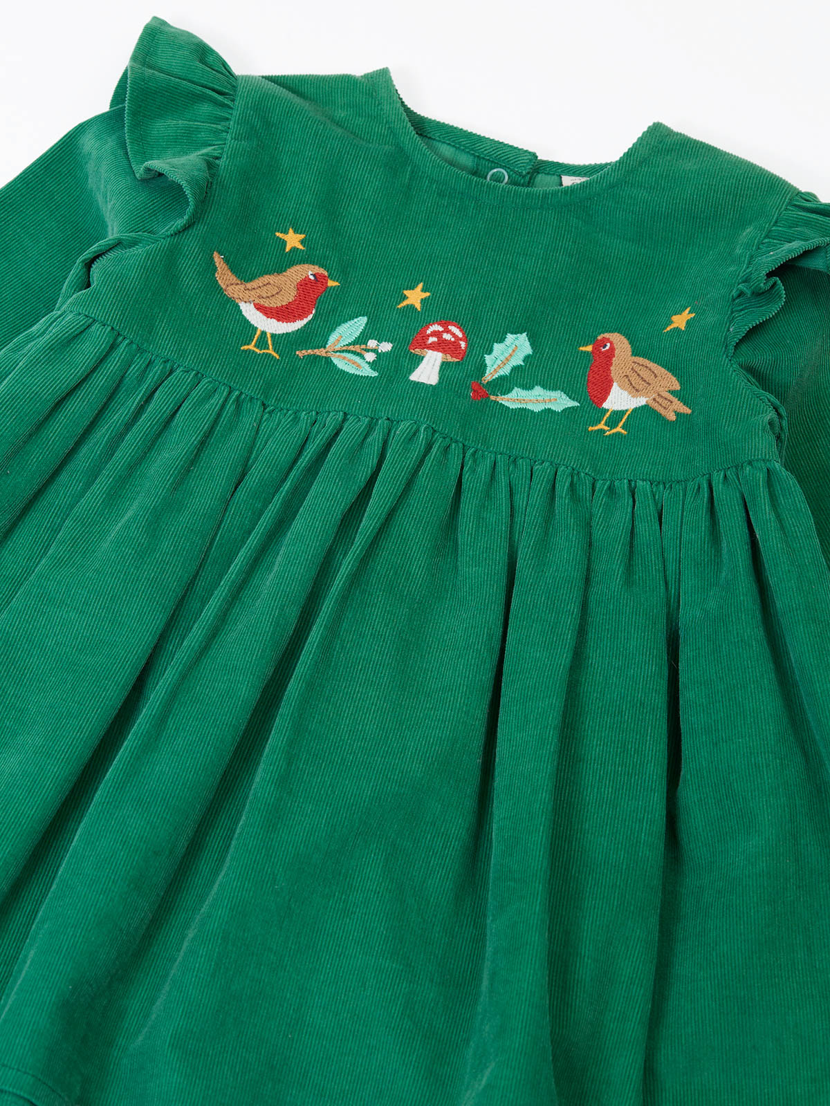 Green Frugi corduroy Christmas dress featuring embroidered robins, mushrooms, and stars on a white background.