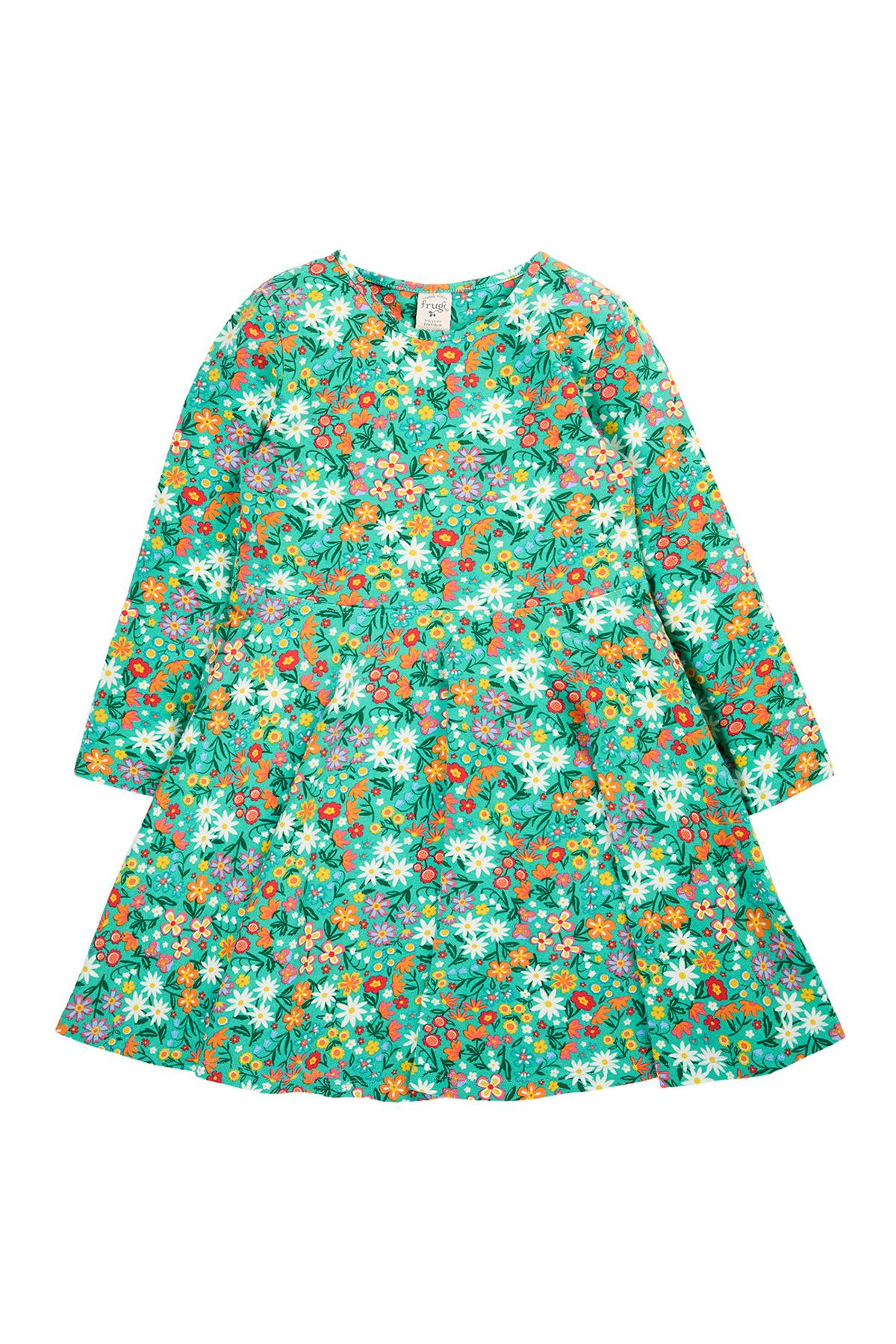 A Frugi long sleeve girls dress in a green floral print made from organic cotton.