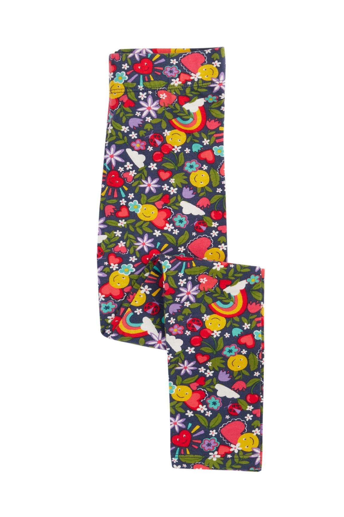 Colorful organic cotton leggings with floral and rainbow pattern on a white background